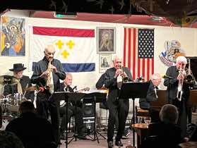 Noel Akester on clarinet and saxophone (Noel was one of the original Club musicians playing with John Paddon's South Wold Jazz Band in 1963). Tony Peatman – banjo (Tony was another early member of the band in the 1960s). Howard Goy – drums; Colin Gordon – trombone; Peter Surfleet – trumpet; Peter Tabois – piano; Graham Penn – bass guitar.